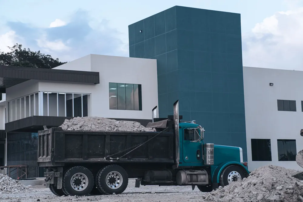 Loaded dump truck ready to deliver bulk mulch across the Norman and OKC metro area