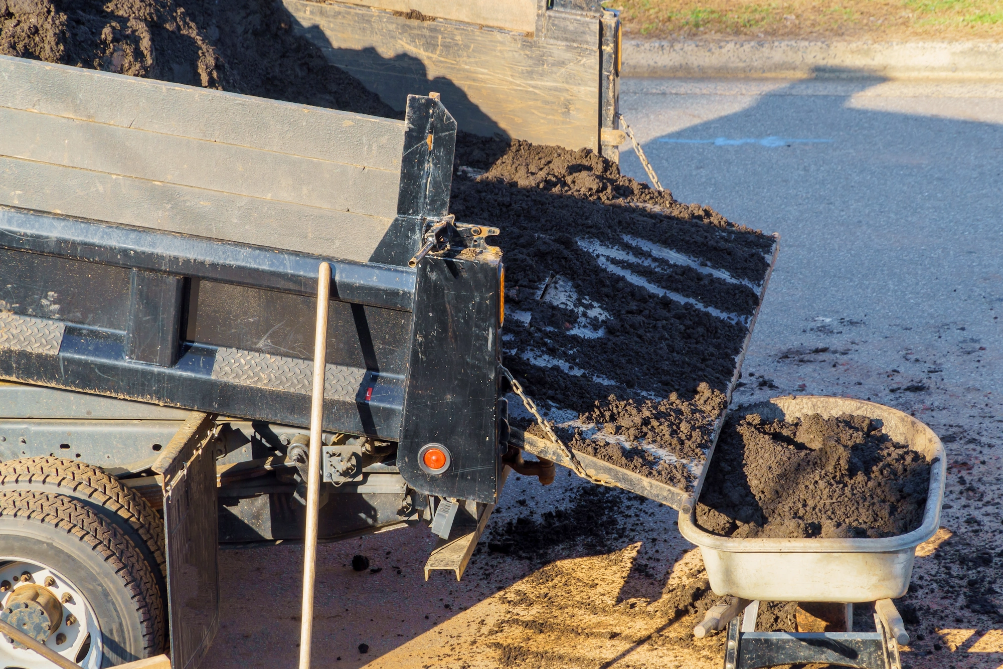 Bulk compost and landscape material delivery truck in Norman Oklahoma
