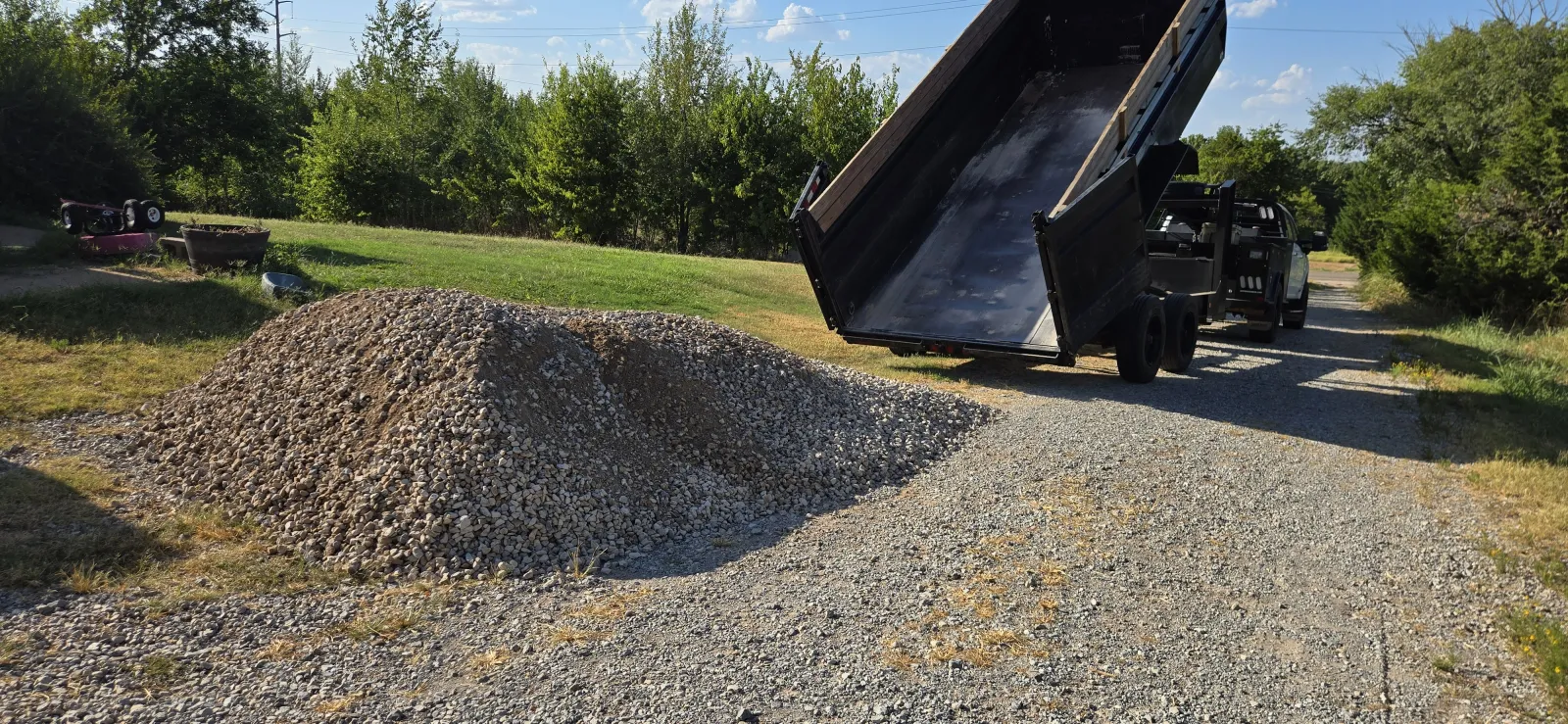 Bulk road base gravel delivered by the cubic yard from the Riverside Wood yard in Norman, Oklahoma